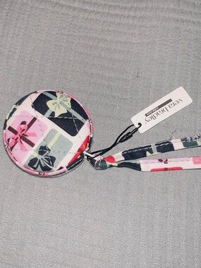 One new Vera Bradley tape measure in the pattern GIFTS APLENTY!